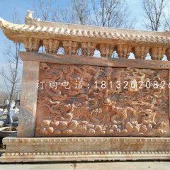 九龍影壁雕塑，晚霞紅石雕影壁